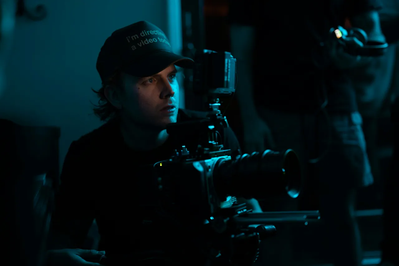Beau Horyza behind a cinema camera on set